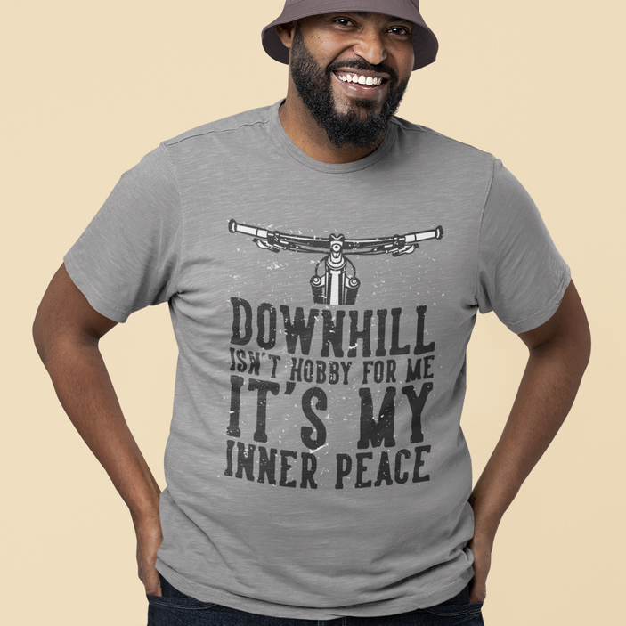 Smiling man wearing a Downhill Is My Inner Peace Tee